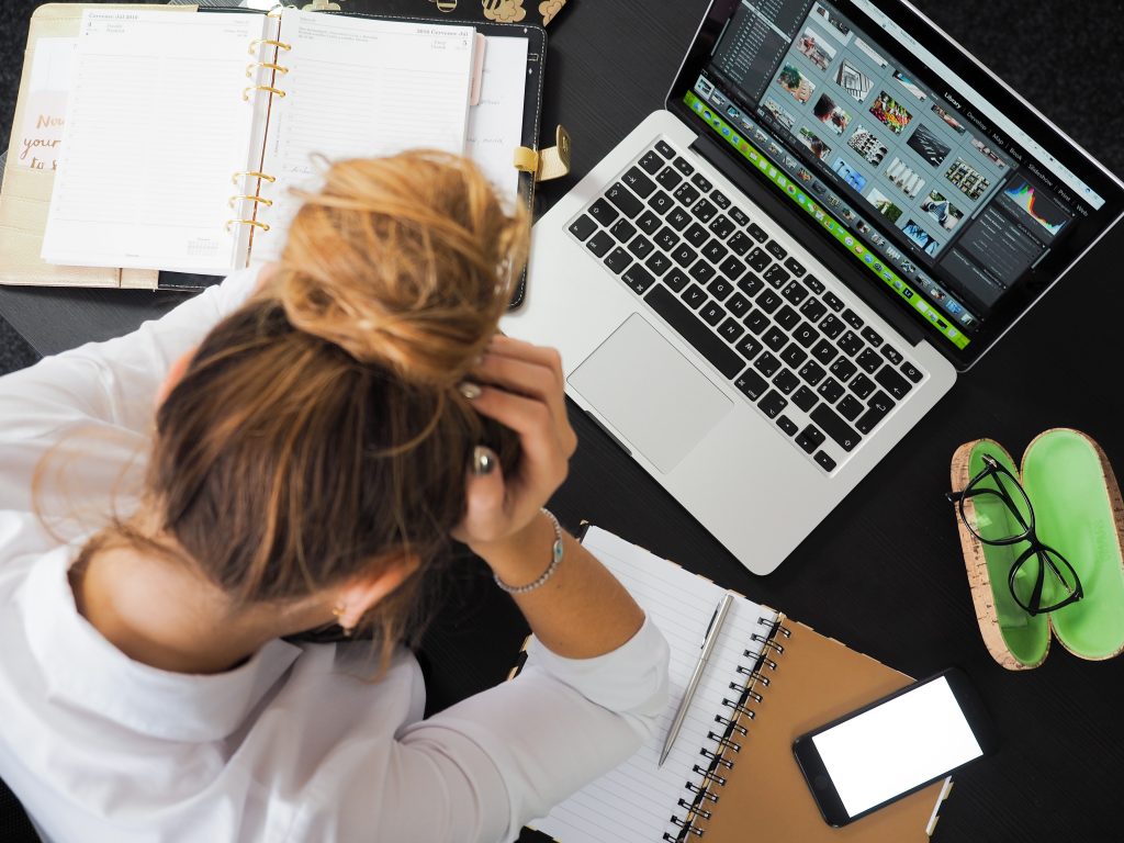 Frustrated woman looking at work