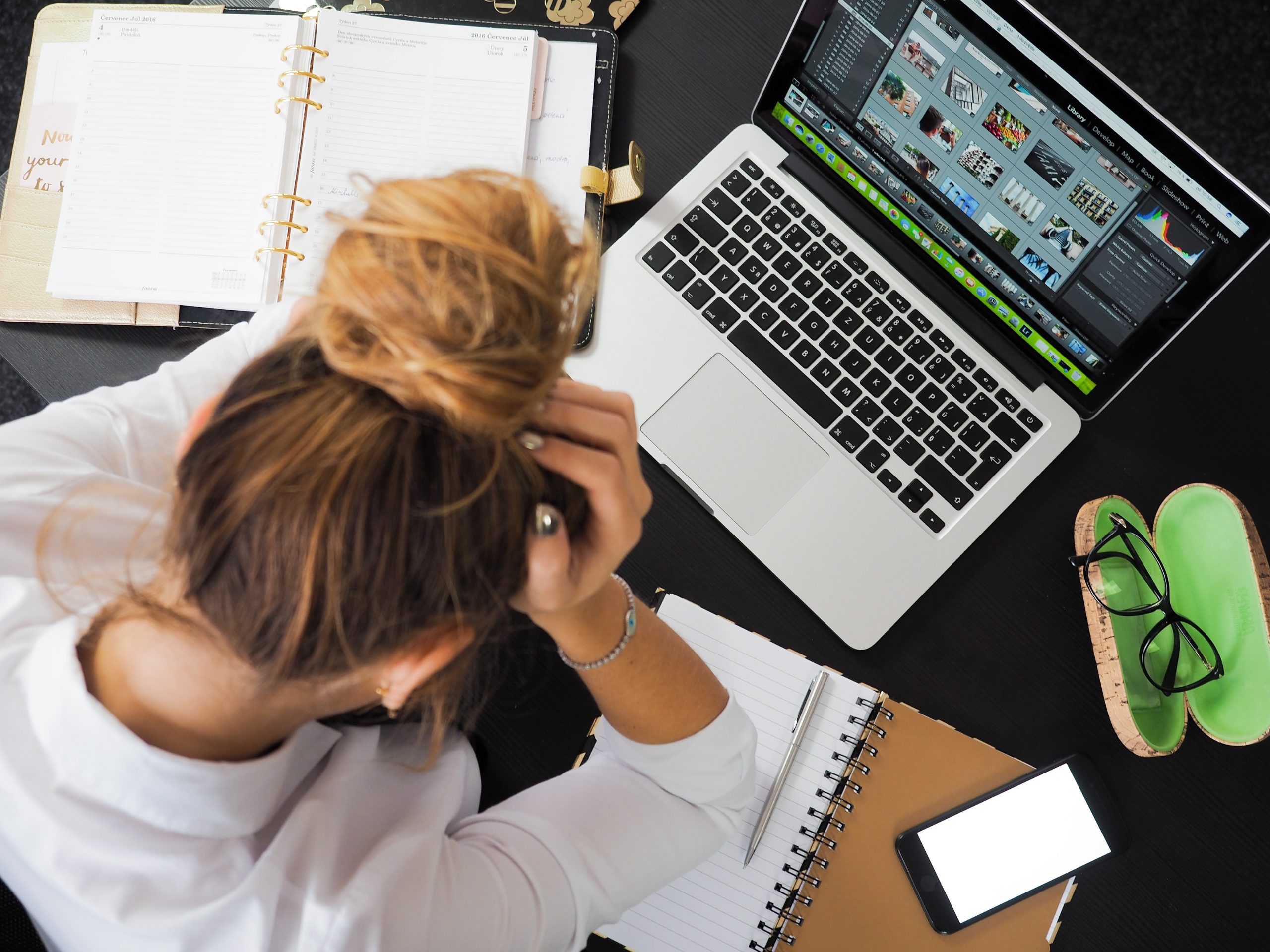 Woman frustrated while on laptop